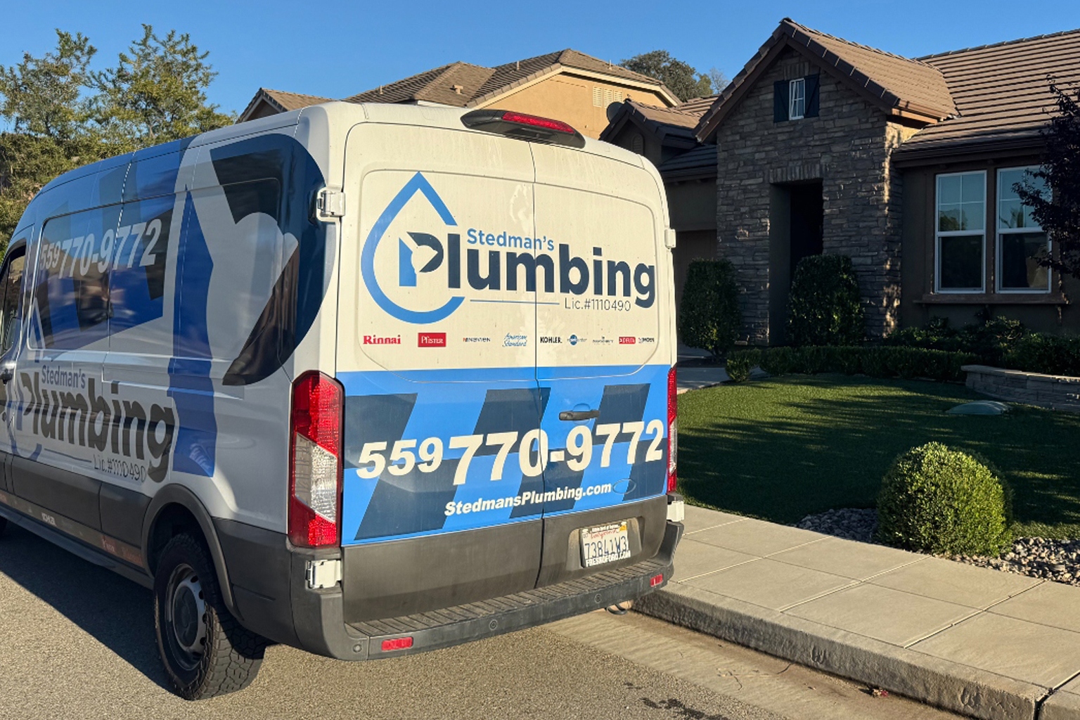 Stedman's Plumbing service van parked at a customer's home in Fresno